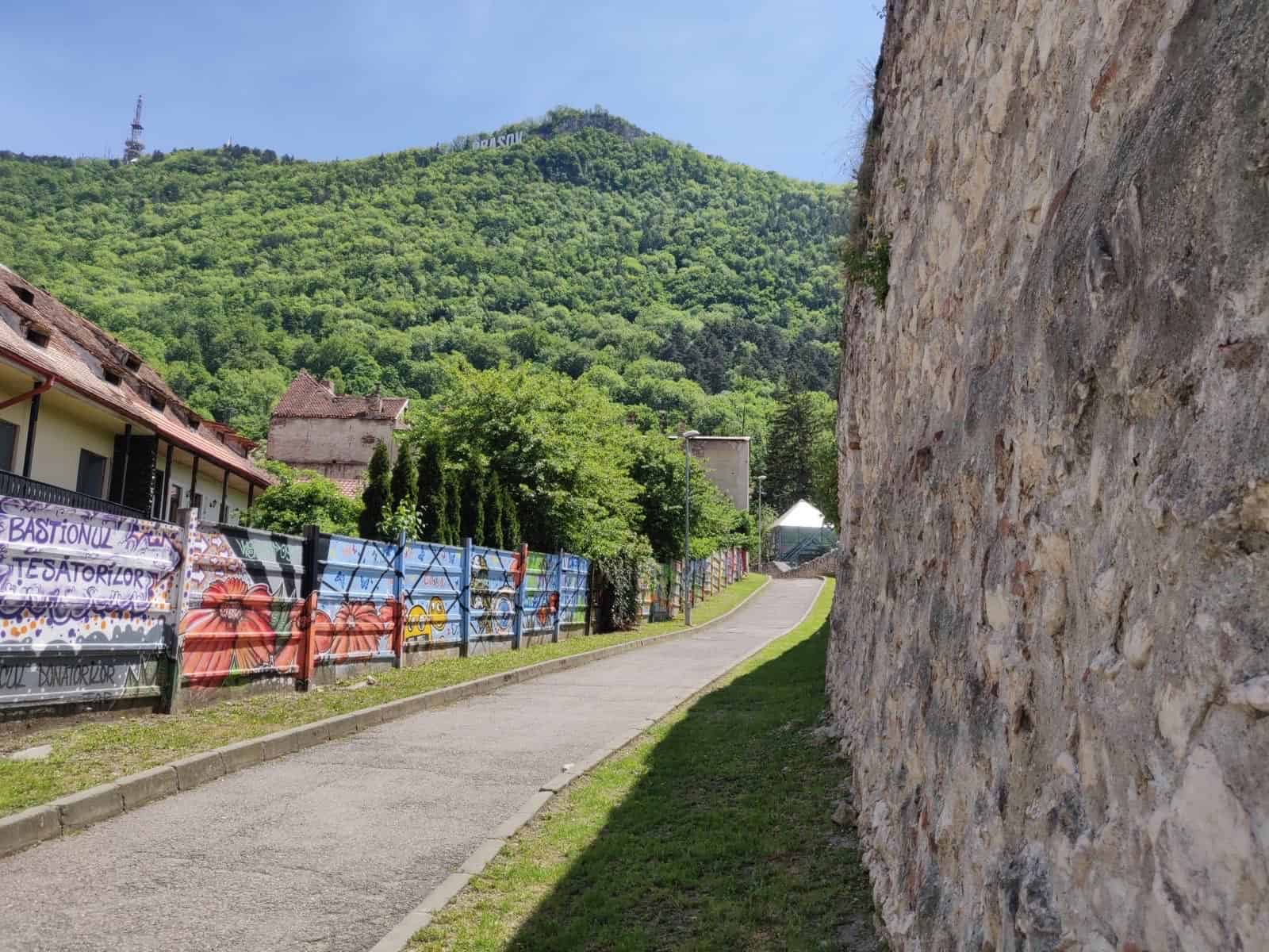 The old city walls, and a view up Mount Tâmpa